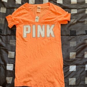 PINK Victoria's Secret Neon Orange V‑Neck Tee with White Logo